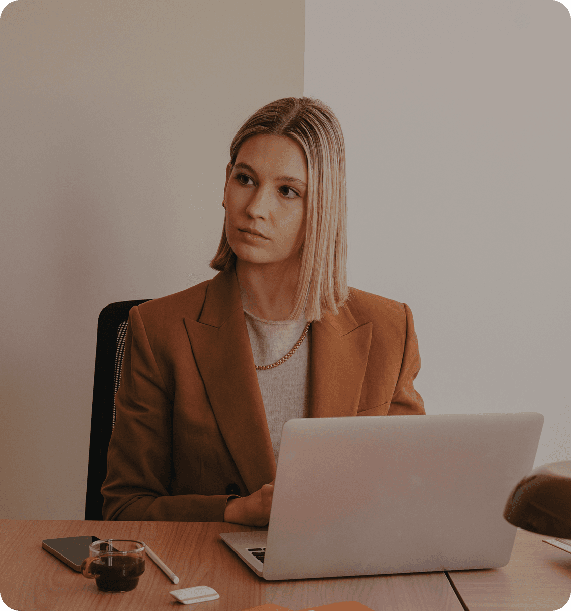 A productized-service founder reviewing work